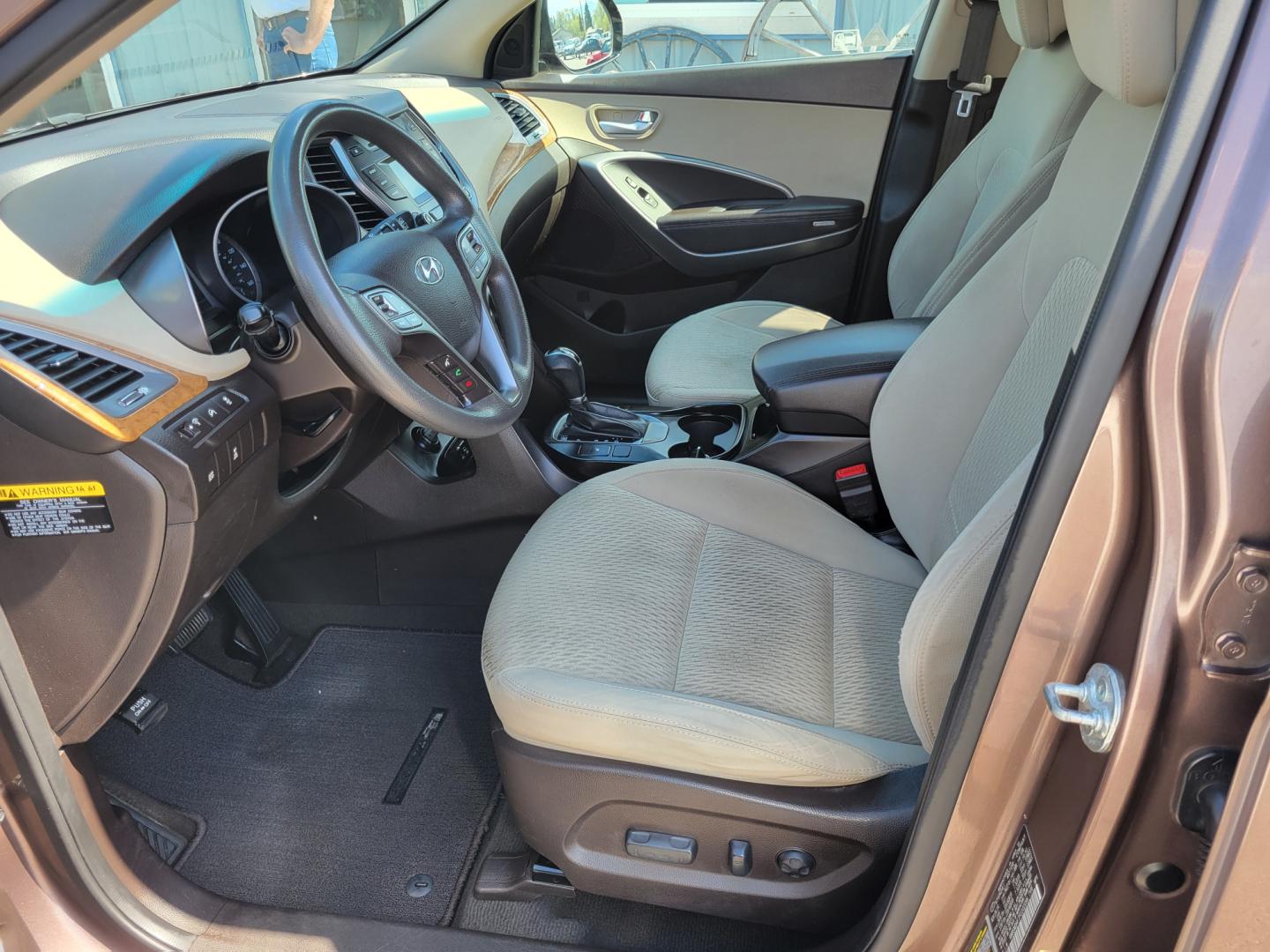 2015 Brown /Tan Hyundai Santa Fe GLS (KM8SMDHF7FU) with an 3.3L V6 engine, 6 Speed Auto transmission, located at 450 N Russell, Missoula, MT, 59801, (406) 543-6600, 46.874496, -114.017433 - Great Running AWD SUV. 3.3L V6 Engine. 6 Speed Automatic Transmission. 3rd Row Seating. Heated Front Seats. Power Drivers Seat. Backup Camera. AM FM XM CD. Bluetooth. Newer Continental Tires from Les Schwab. New Brakes. Air. Cruise. Tilt. Power Windows and Locks. - Photo#13